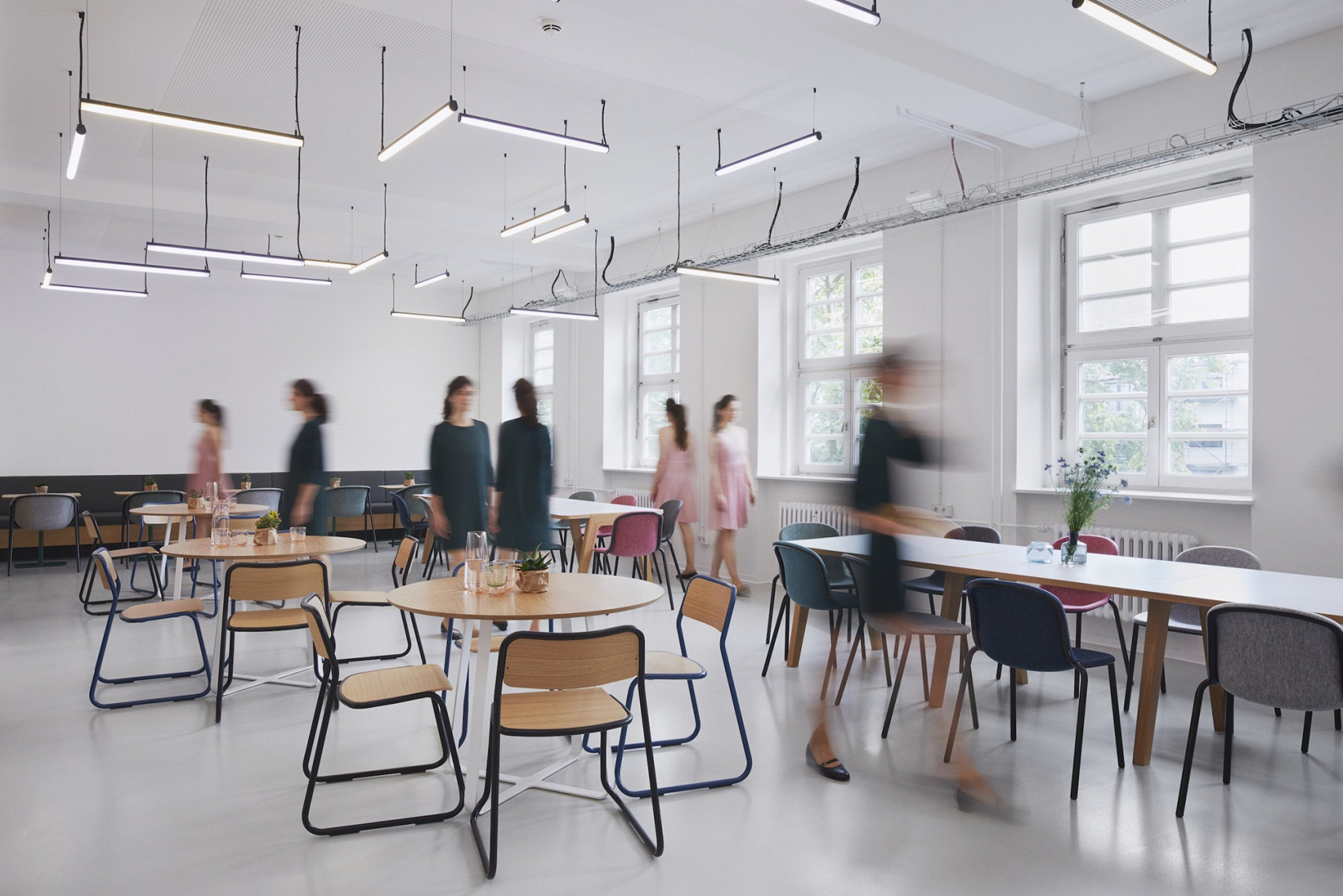 People walking inside FULL NODE office