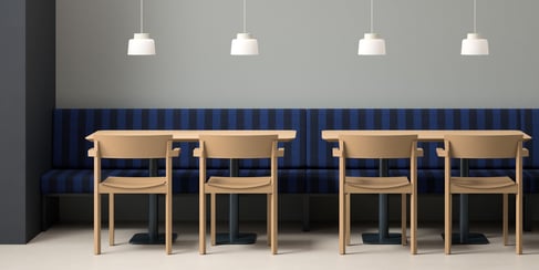 Kaska: a refined, stackable wooden chair designed by Thomas Bentzen