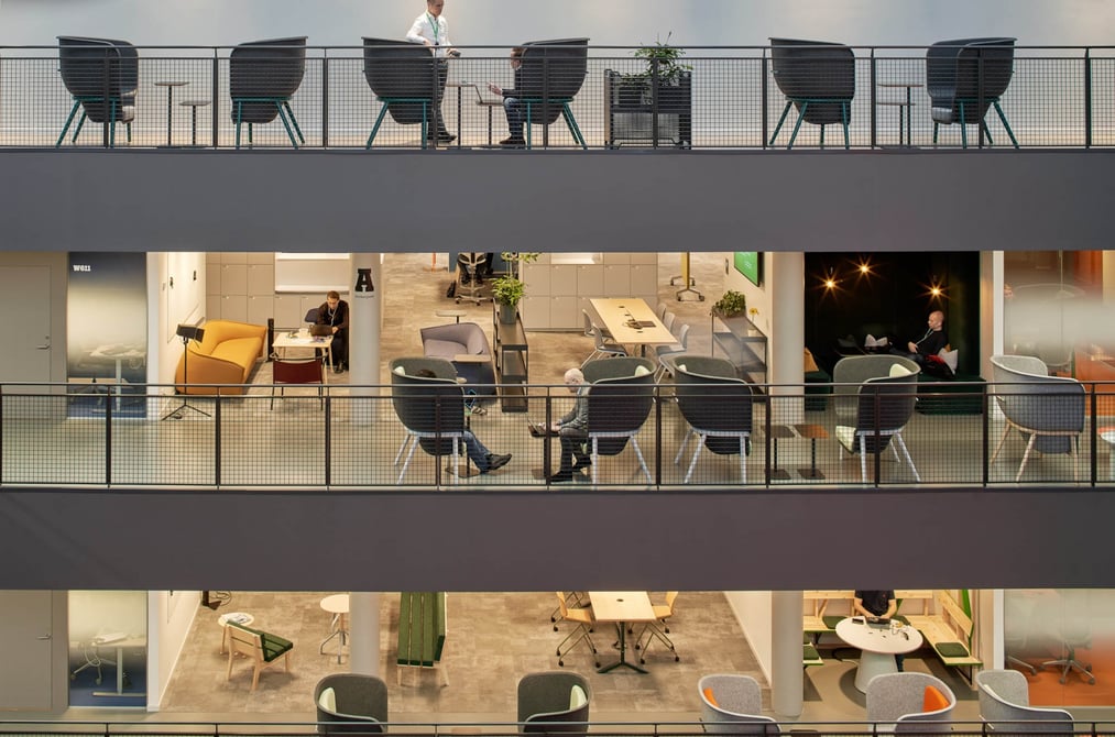 Pod chairs by De Vorm on different floors f Tele 2 office